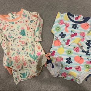 Rufflebutts long sleeve one piece rash guards size 3-6 months. Set of 2